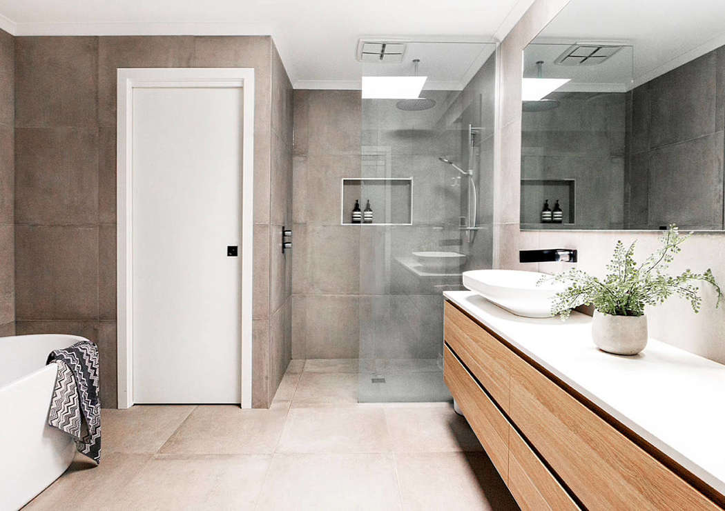 badkamers met inloopdouche betonlook tegels