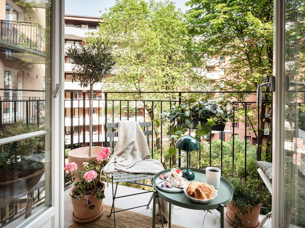 balkon inrichten jute vloerkleed