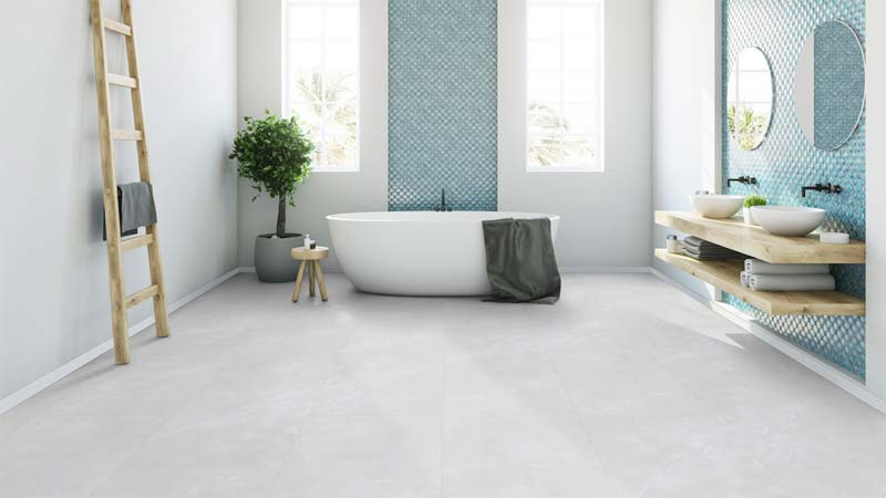 Een stoere kalksteen witte PVC vloer in een strakke moderne badkamer.